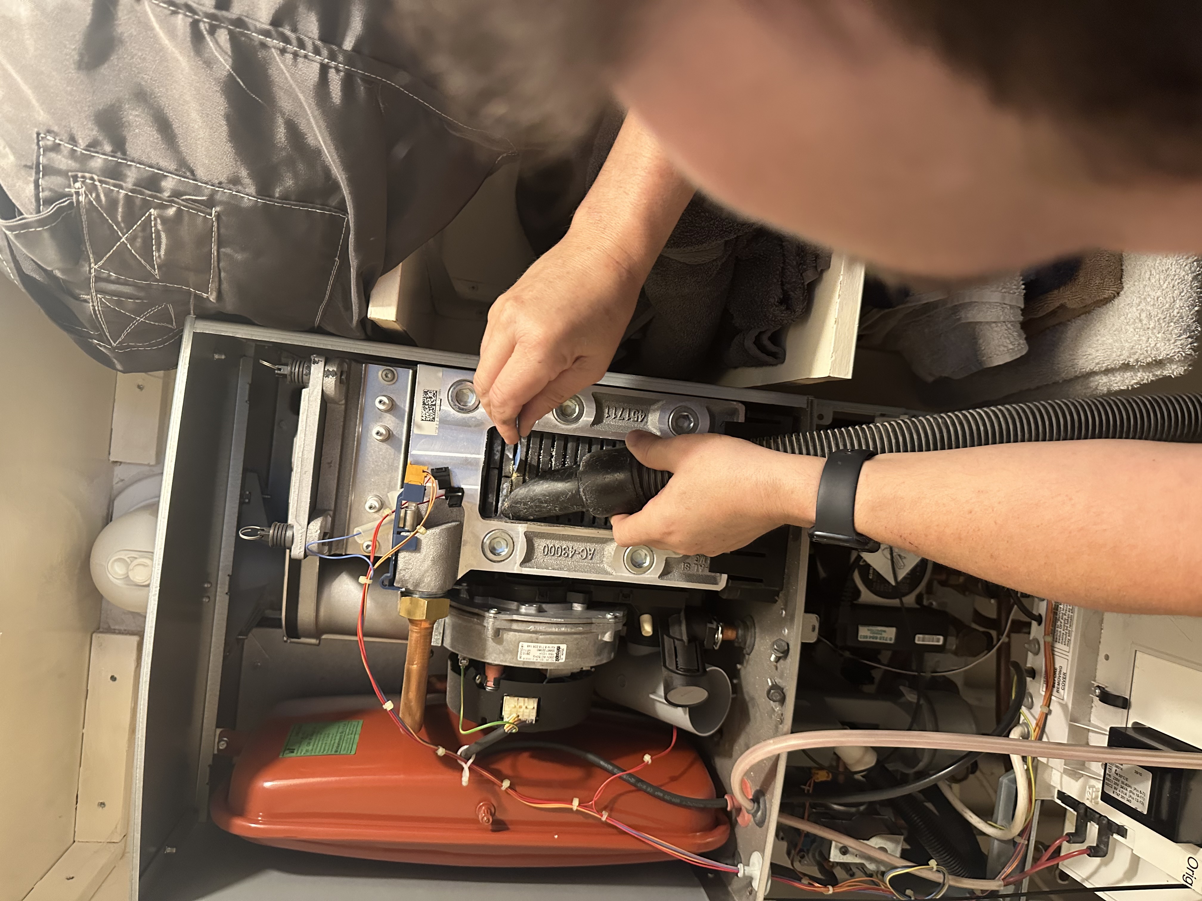 Engineer diagnosing an open boiler