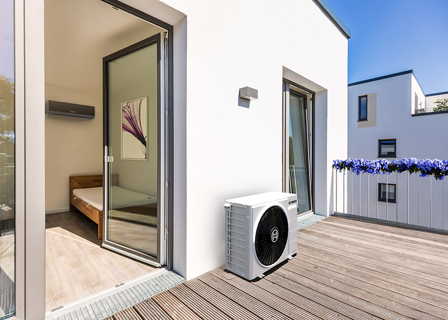 Black wall-mounted air-conditioning unit